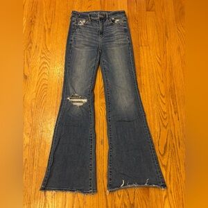 American Eagle Ripped Super High-Waisted Flare Retro Jean raw hem size 0